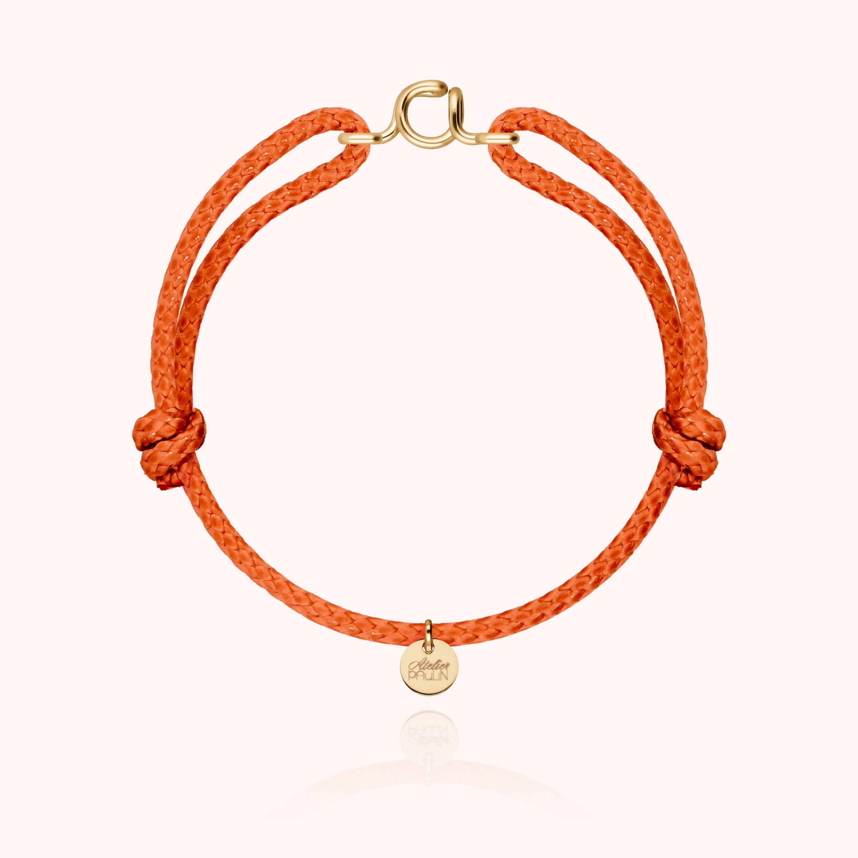 Waxed cord bracelet for men. Personalised gold jewellery with letter initial handcrafted in Paris by Atelier Paulin in 14K yellow gold-filled --colour_orange