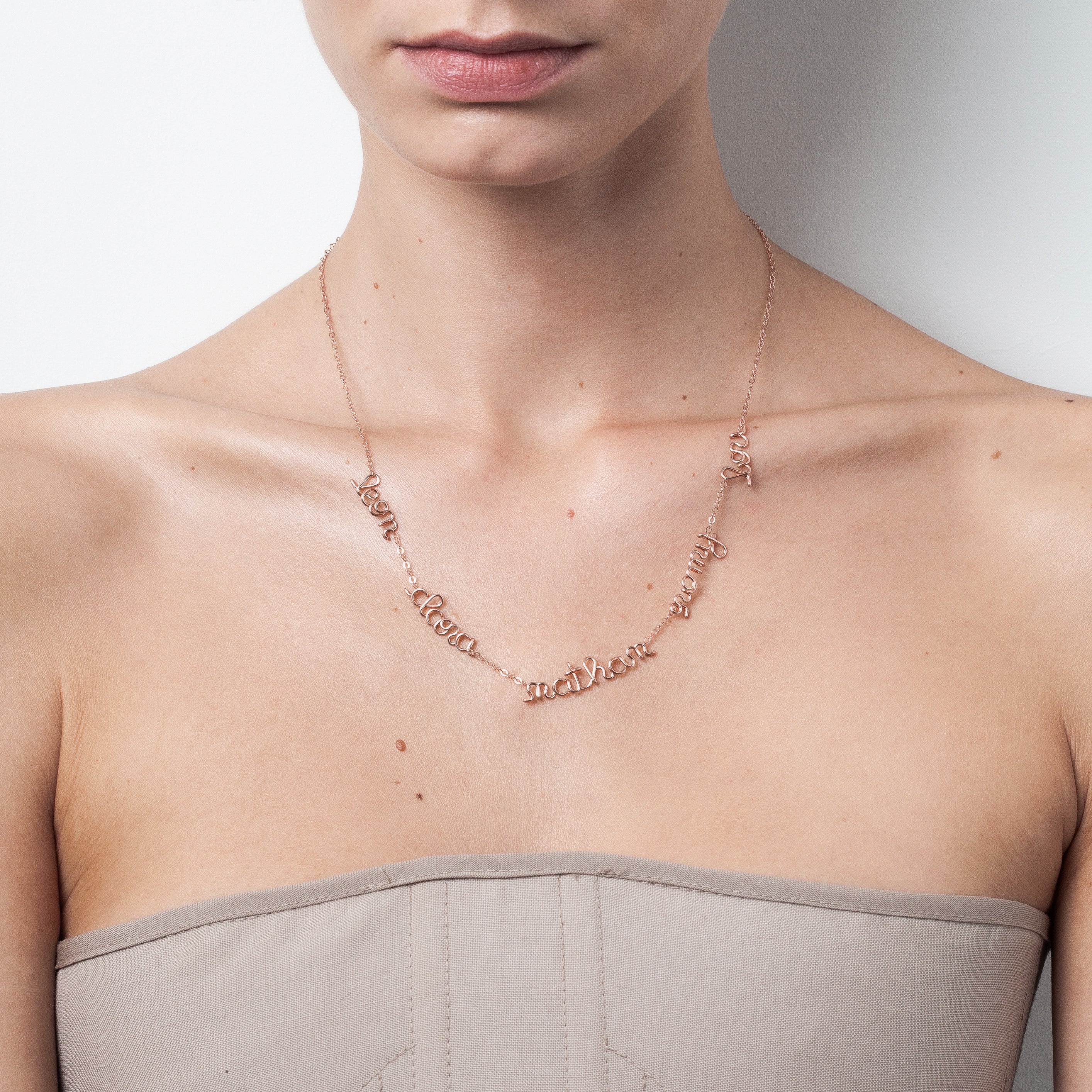 Mantra necklace multiple names personalised on chain rose gold worn on women Atelier Paulin Australia