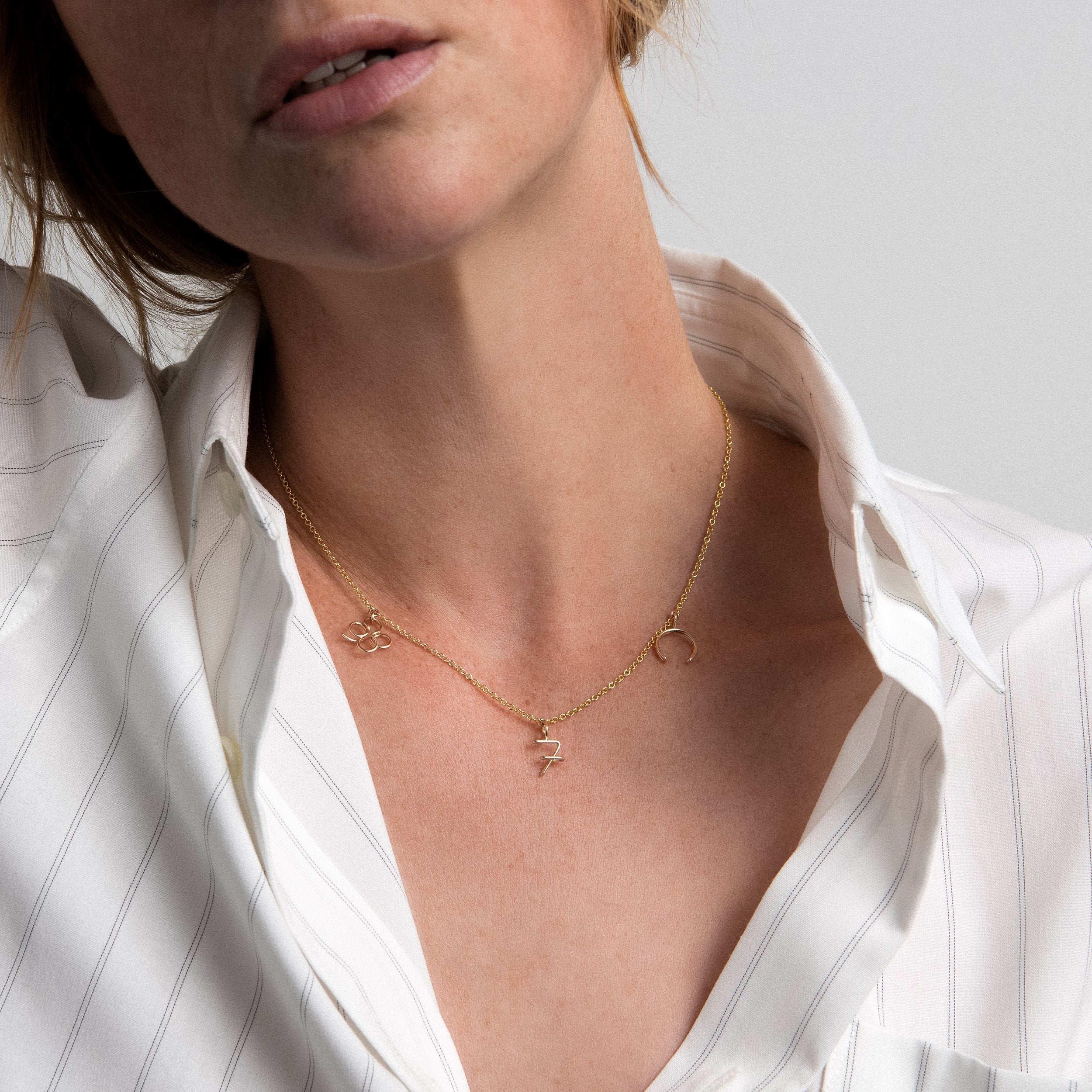 Charms Necklace Wish Me Luck 14k yellow gold-filled worn on neck handmade Atelier Paulin Australia