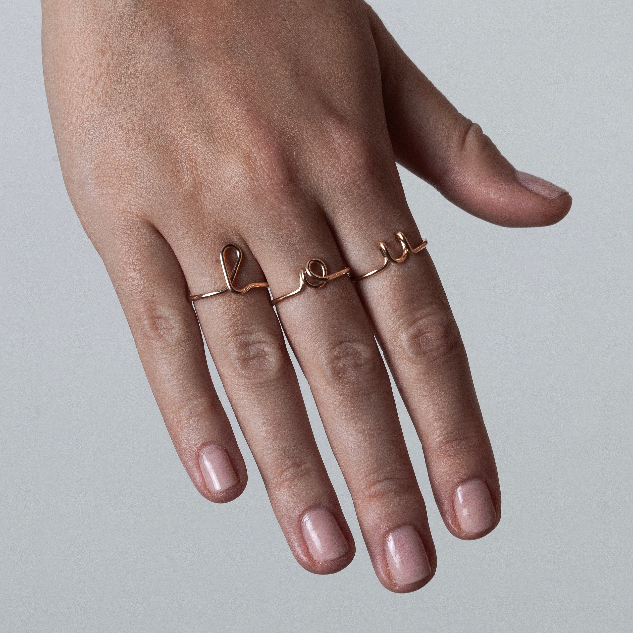 Original ring with initials letter a personalisation yellow gold worn on finger Atelier Paulin Australia