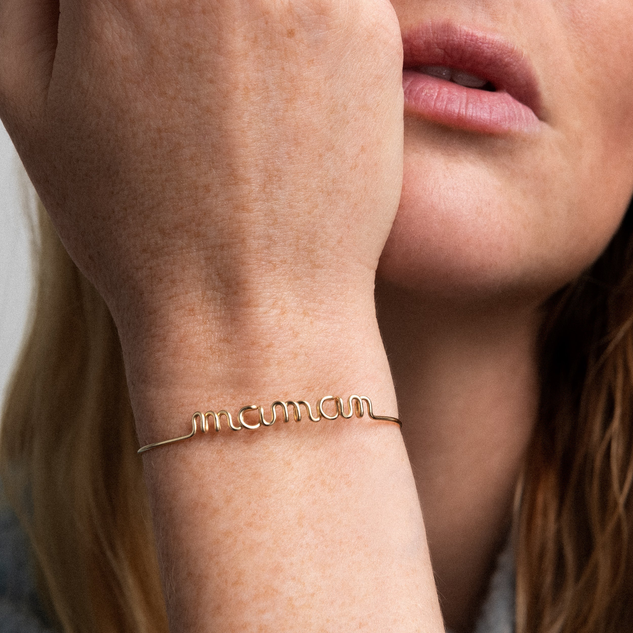 Original wire bracelet word maman mum 14K yellow gold-filled worn on wrist Atelier Paulin
