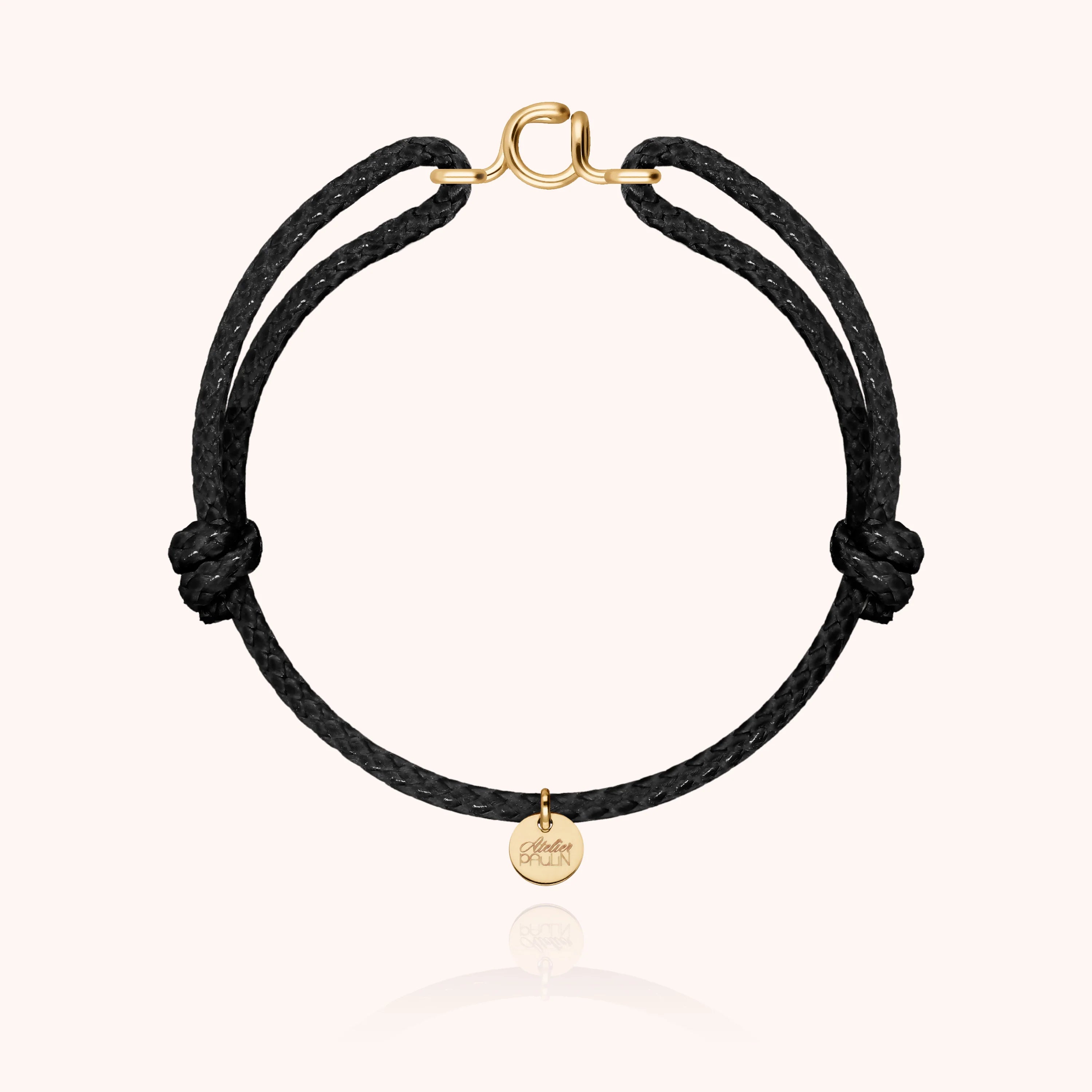Waxed cord bracelet for men. Personalised gold jewellery with letter initial handcrafted in Paris by Atelier Paulin in 14K yellow gold-filled --colour_black