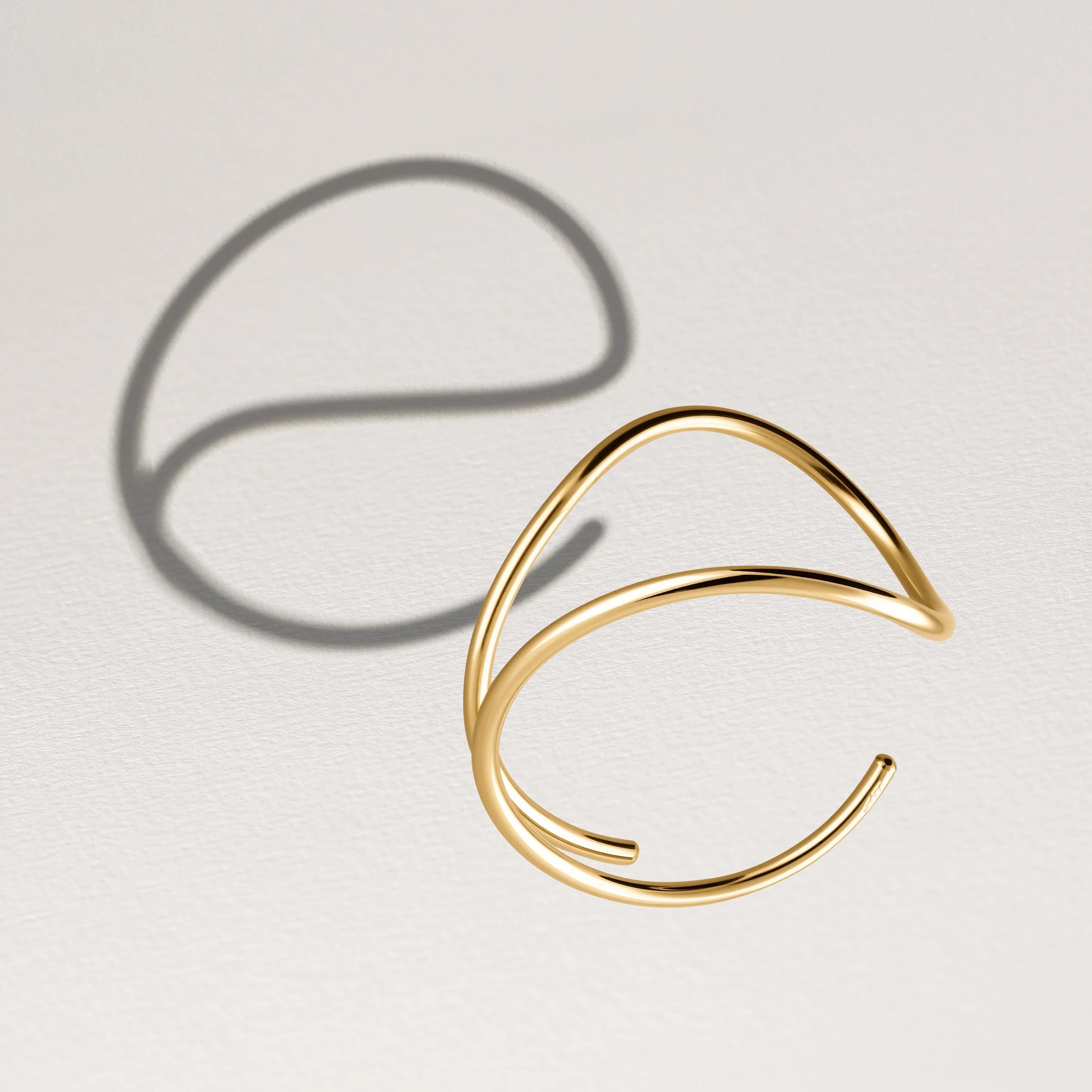 Outline cuff bracelet letter e 14k yellow gold-filled shadow play handmade Atelier Paulin Australia
